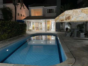 Casa de praia em Riviera no Módulo 21